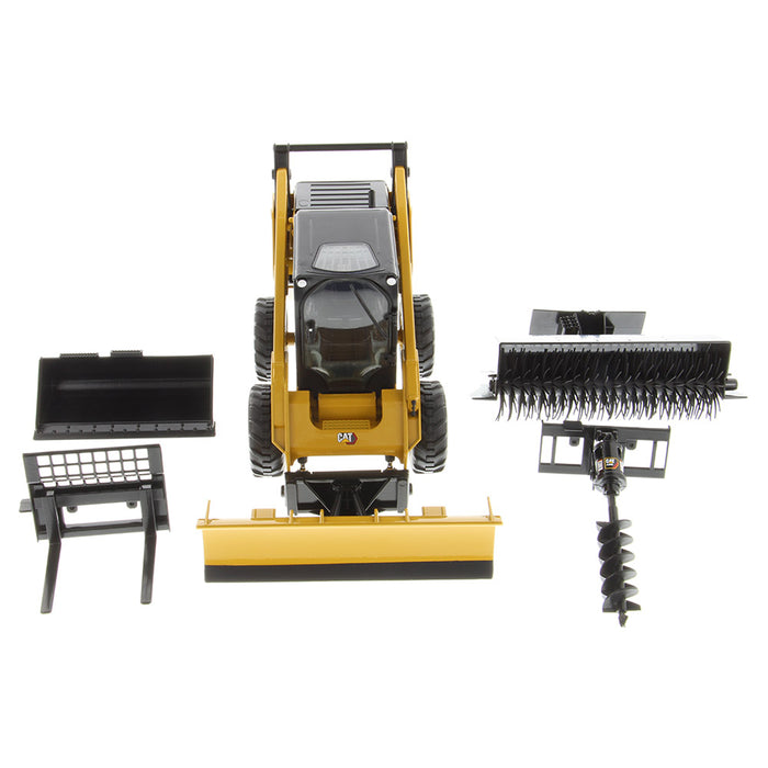 1:16 Cat 272D3 Skid Steer Loader + bucket, pallet forks, broom and snow blade accessories (Yellow + Black assortment)