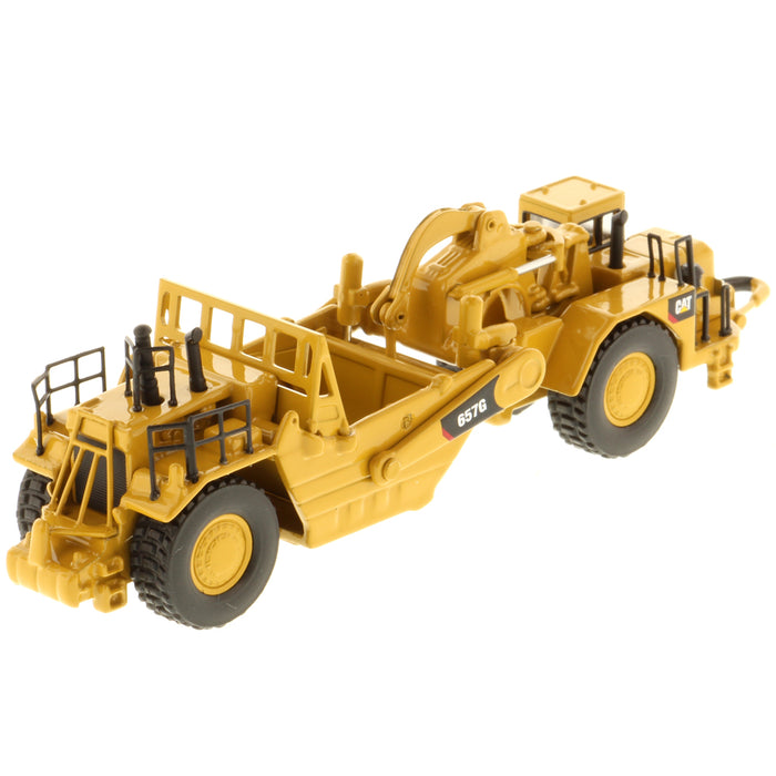 1:50 Diecast Masters Caterpillar CAT 657G Wheel Tractor Scraper - Metal Model 85175
