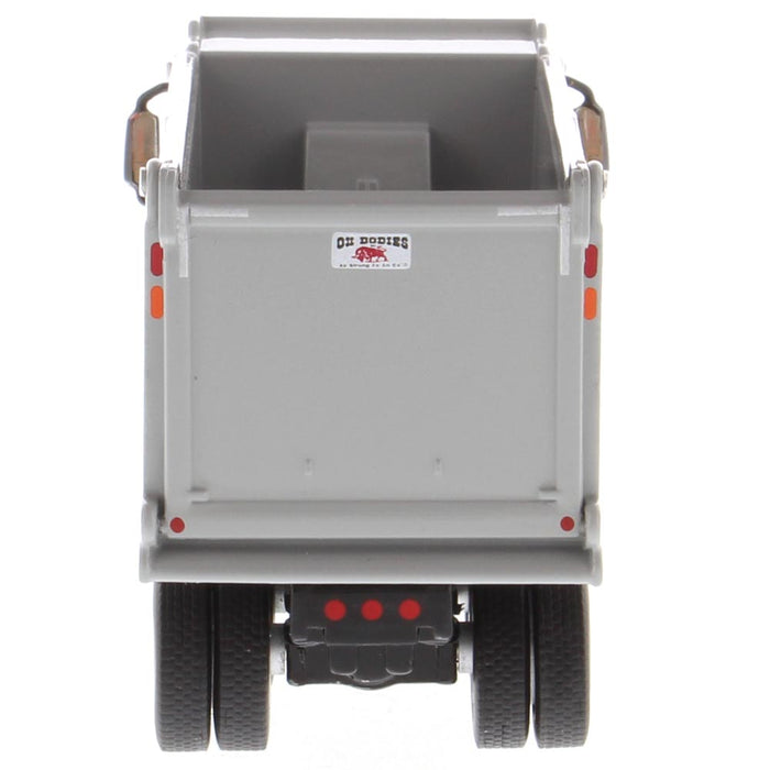 1:64 Cat® CT660 OX Stampede Dump-Truck — Diecast Masters America